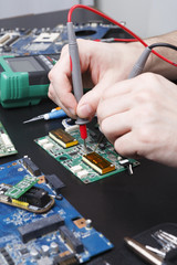 Poster - Electronic circuit board inspecting close up