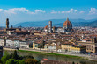 Arno river and rooftops in Florence surrounding The Duomo.