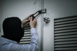 © SP56 - robber in black mask. robbery and crime concept.