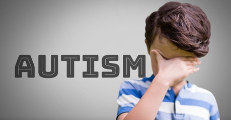 Poster - Boy against grey background with autism text
