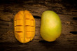 mango on a dark wood background