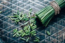 Chopped Chives In A Wrought-Iron Skillet