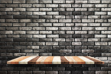 Aufkleber - Empty wood board shelf at black brick wall background,Mock up for display or montage of product or design.
