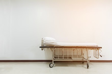 Empty Stretcher Trolley Or Hospital Trolley For Patient With White Room.