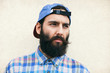 © BONNINSTUDIO/Stocksy - Portrait of hipster bearded man.