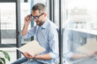 © Yakobchuk Olena - Interested man working in office