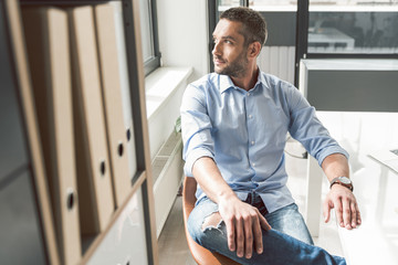 Wall Mural - Thoughtful male person locating in office