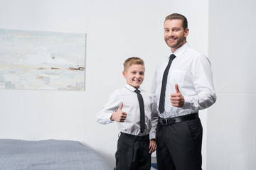 Wall Mural - father and son in formal wear