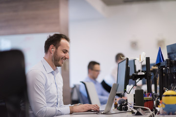 businessman working using a laptop in startup office