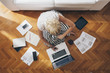 © Lumina/Stocksy - Businesswoman Sitting on the Floor and Working