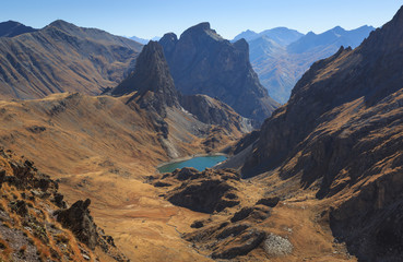 Poster - A valley in the French Alps during a clear day in autumn.
