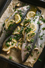 Sea Bass With Lemon And Spices Ready To Be Grilled