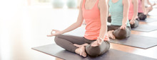 Attractive Young Asian Woman Group Exercising And Sitting In Yoga Lotus Position In Yoga Classes