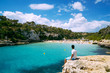 © ACALU Studio/Stocksy - Young man looking at the beach