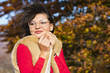 © czamfir - Beautiful young brunette enjoys a sunny day of autumn in nature