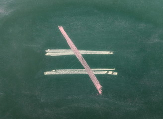  Unequal symbol, sign on chalkboard, blackboard texture