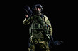 © andy_gin - The soldier of the special unit stands in military uniform with a ram on his shoulder and a device for opening the doors.