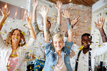 Poster - Joyful young people dancing at home party in confetti rain