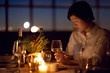 © Jill Chen/Stocksy - Romantic dinner alone