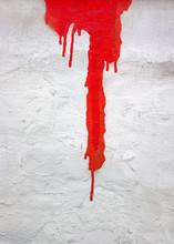 Red Paint Dripping On A Concrete Wall