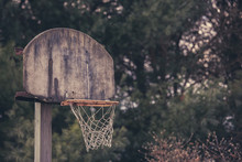 Old Basketball Hoop At An Abandoned Court