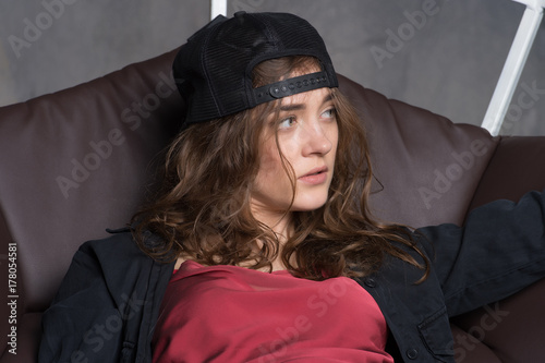 Girl With Long Hair Wearing Baseball Cap Back To Front Buy This