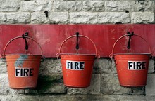Fire Buckets Hanging On A Wall