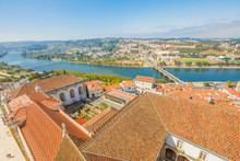 Coimbra Cityscape And Santa Clara Bridge On Mondego River. Coimbra In Central Portugal, Is Famous For Its University. Coimbra Aerial View From Bell Clock Tower In A Sunny Day.