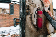 House Fire With Unused Fire Extinguisher