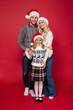 © Drobot Dean - Full length portrait of a smiling family with a child