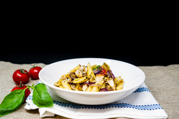 Wall Mural - Spaghetti with aubergine and tomato sauce on a the table