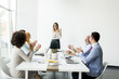 © BGStock72 - Business people discussing a strategy and working together in office