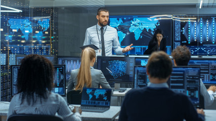 Fototapete - Chief Project Engineer Holds Briefing for a Team of Scientists that are Building Machine Learning System. Displays Show Working Model of Neural Network.