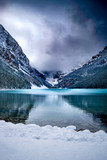 Fototapeta Góry - Mountains snow and turquoise lake