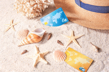 Canvas Print - Credit cards and shells on sand