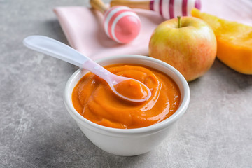 Sticker - Ceramic bowl with baby food on table