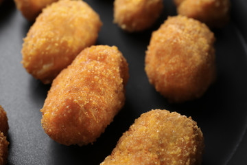 Sticker - Delicious salmon croquettes on frying pan, closeup