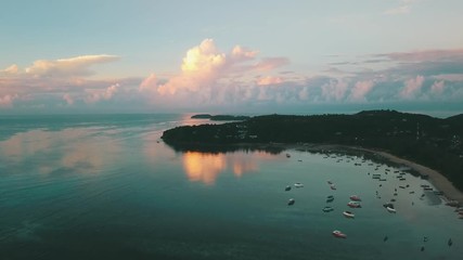 Wall Mural - sunrise bay in tropical island with calm water surface and beautiful lagoon view