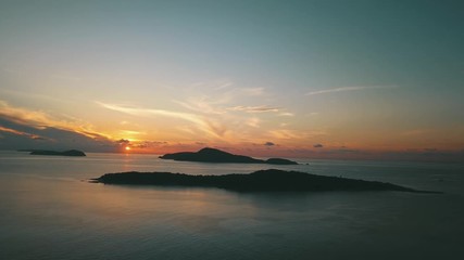 Wall Mural - sunrise bay in tropical island with calm water surface and beautiful lagoon view