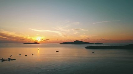 Wall Mural - sunrise bay in tropical island with calm water surface and beautiful lagoon view