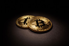 Golden Bitcoins Coins On Black Background