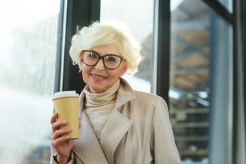 Wall Mural - senior lady with coffee