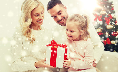 Sticker - happy family at home with christmas gift box