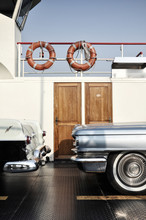Two Vintage Cars On A Ferryboat