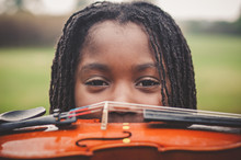 Girl And Violin Closeup