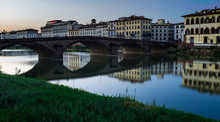 Arched Bridge  And Reflections On The Amo River, Florence