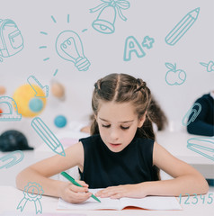 Wall Mural - Schoolgirl studying in classroom