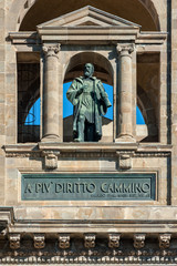 Wall Mural - Galileo Galilei statue on the facade of the National Library of Florence, Italy