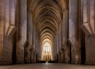 Canvas Print - View towards the main chapel and ambulatory of the medieval Alcobaca Monastery, the first truly Gothic building in Portugal, started in 1178, completed in 1252.