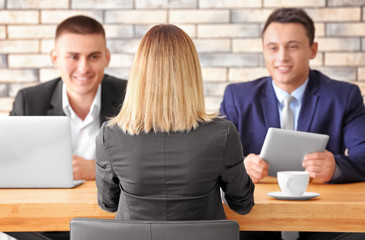 Sticker - Human resources commission interviewing woman at table